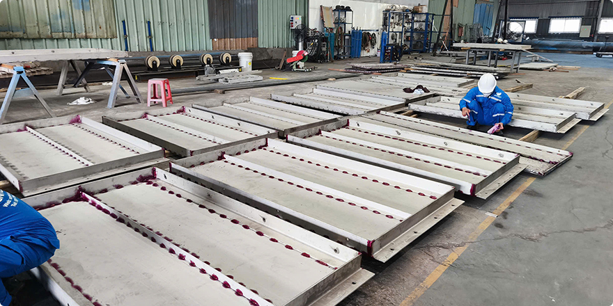 Mega Cambo Construction Company - SS Baffle and Beam